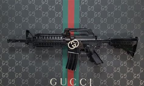 gucci gun|Gucci gun slang.